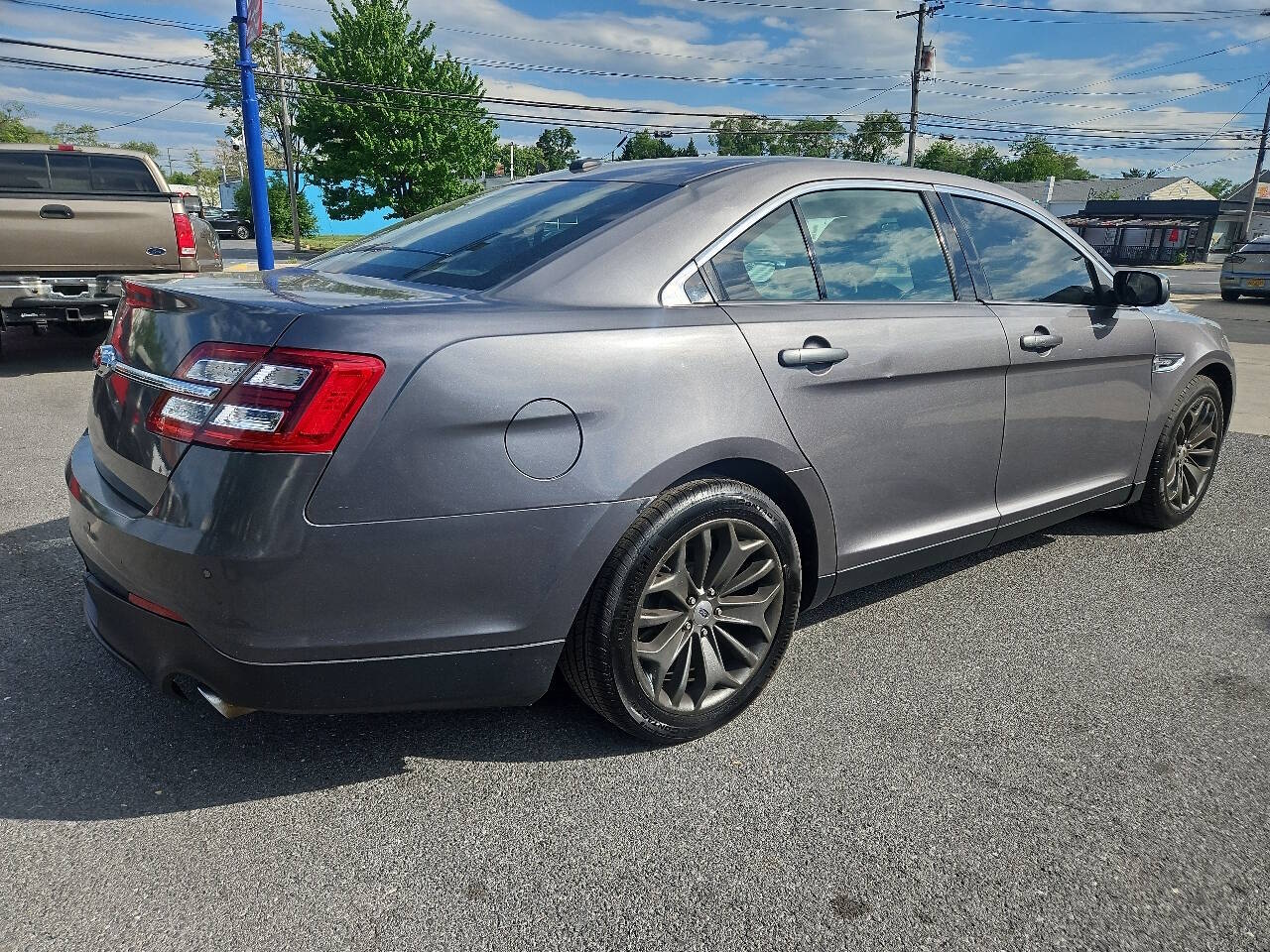 2014 Ford Taurus Limited Sedan 4D photo 4
