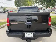 2009 Ford Explorer Sport Trac XLT Sport Utility Pickup 4D photo 6