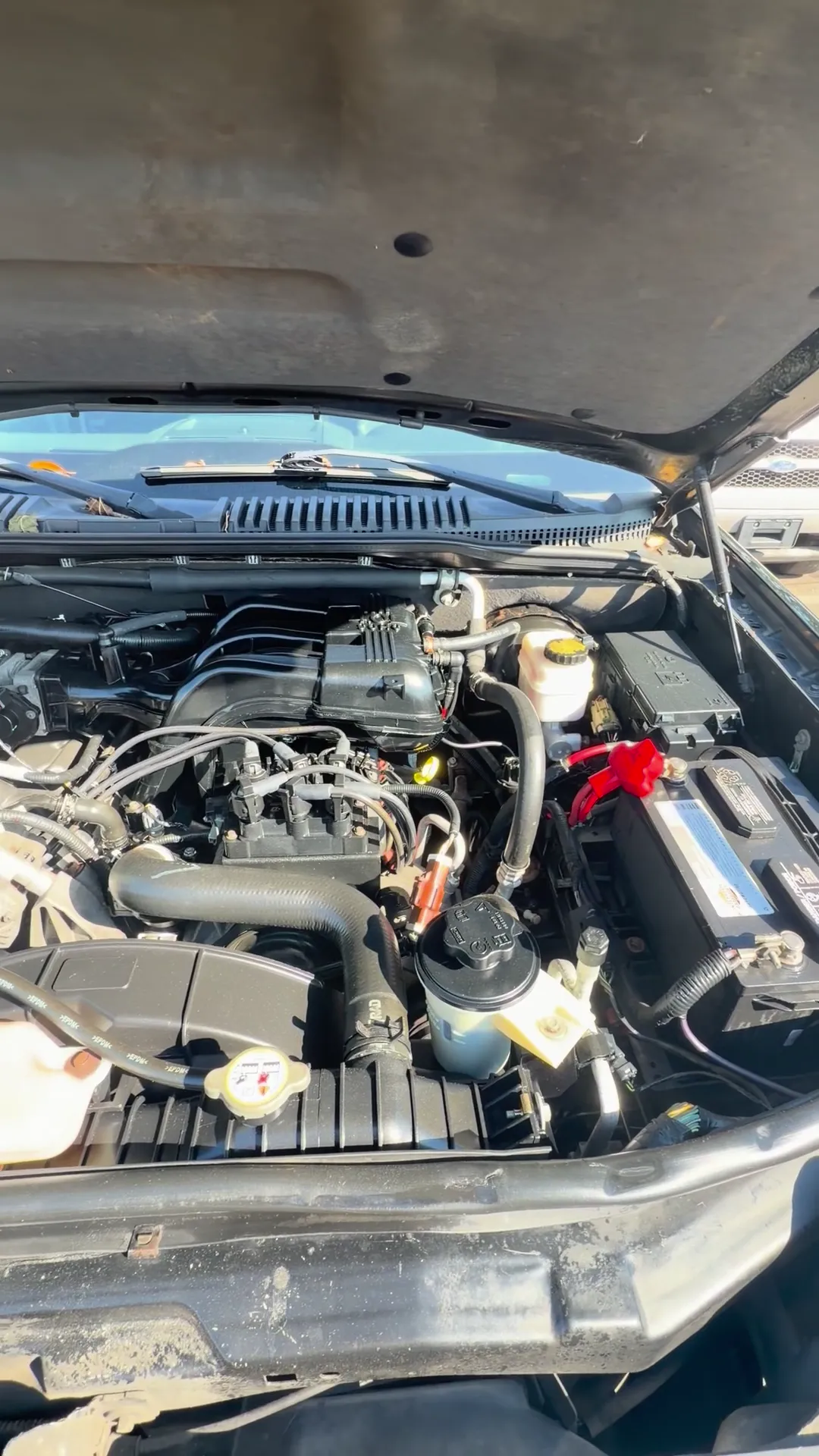 Engine bay of 2009 Ford Explorer Sport Trac XLT Sport Utility Pickup 4D