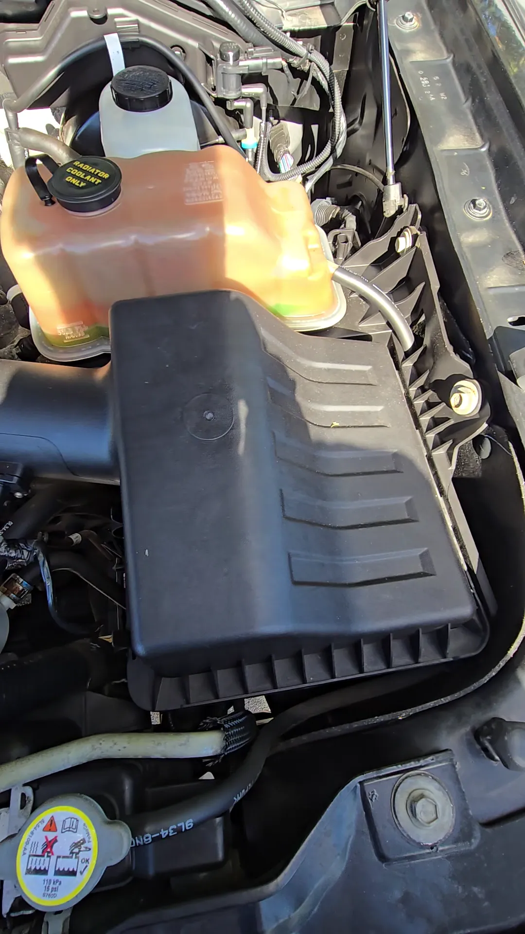 Engine bay of 2010 Ford F150 SuperCrew Cab Lariat Pickup 4D 6 1/2 ft