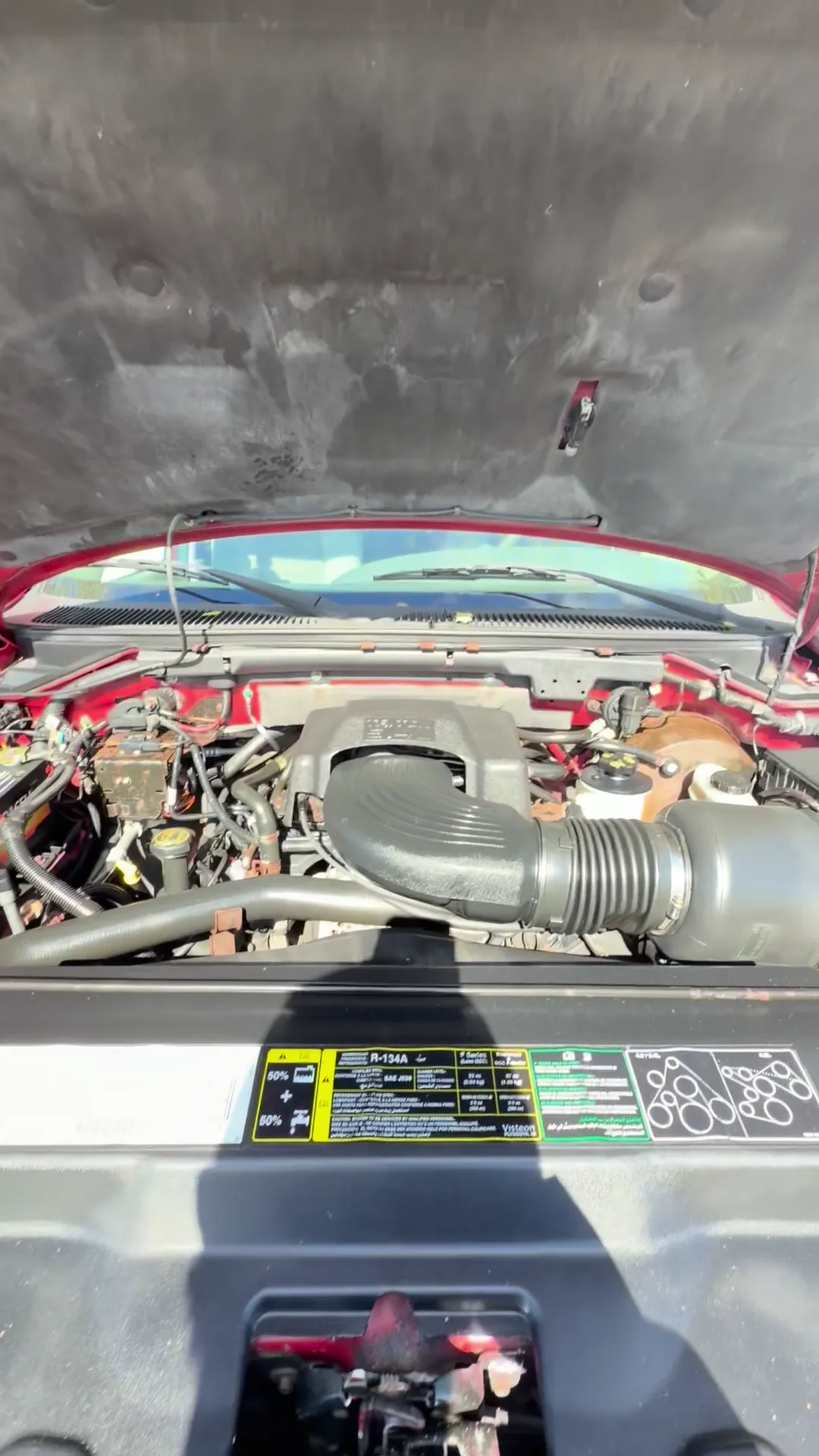 Engine bay of 2003 Ford F150 SuperCrew Cab XLT Pickup 4D 5 1/2 ft