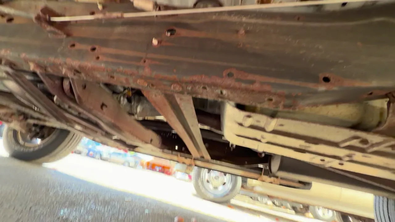 Underneath of 2003 Ford F150 SuperCrew Cab XLT Pickup 4D 5 1/2 ft