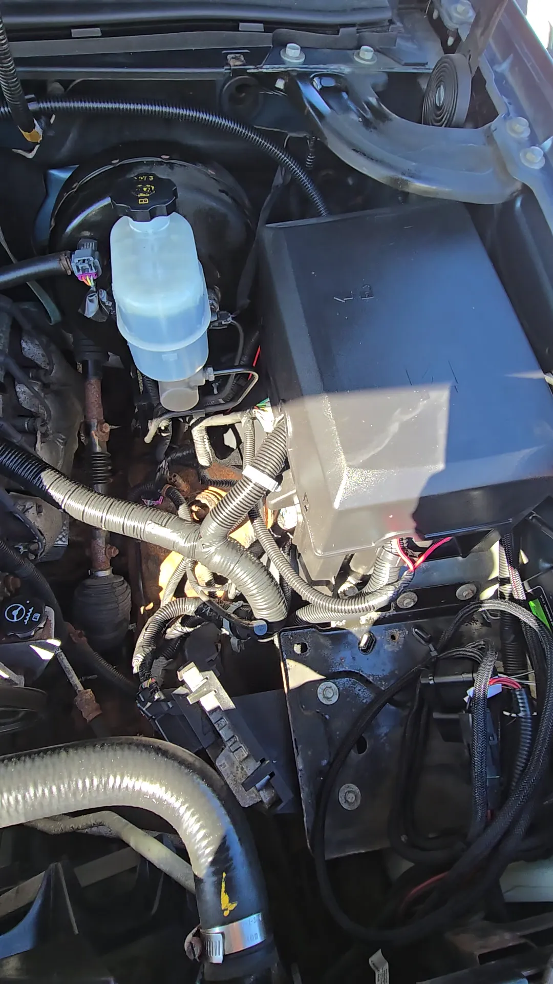 Engine bay of 2013 Chevrolet Silverado 1500 Extended Cab LTZ Pickup 4D 6 1/2 ft