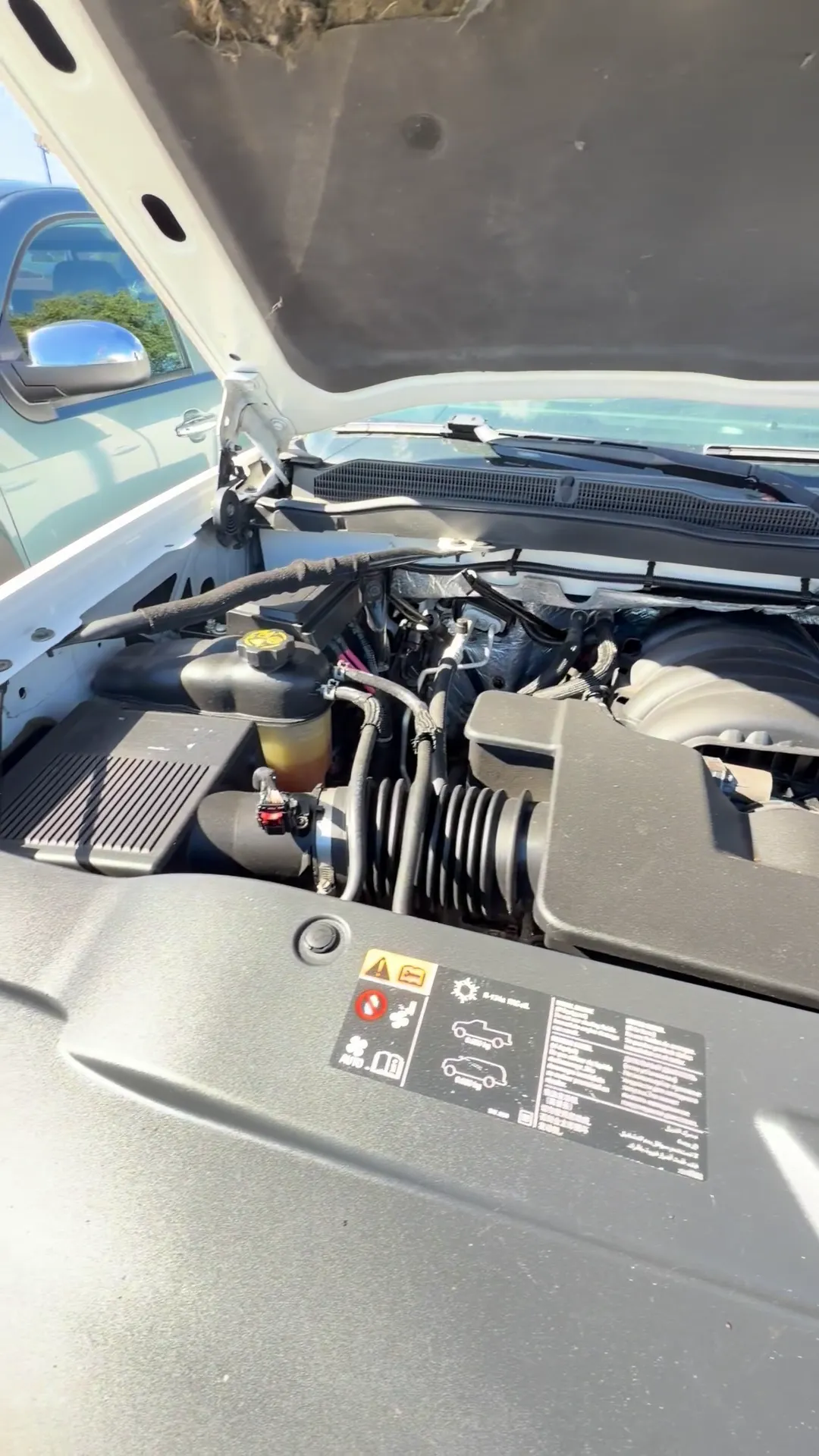 Engine bay of 2015 Chevrolet Silverado 1500 Double Cab LT Pickup 4D 6 1/2 ft