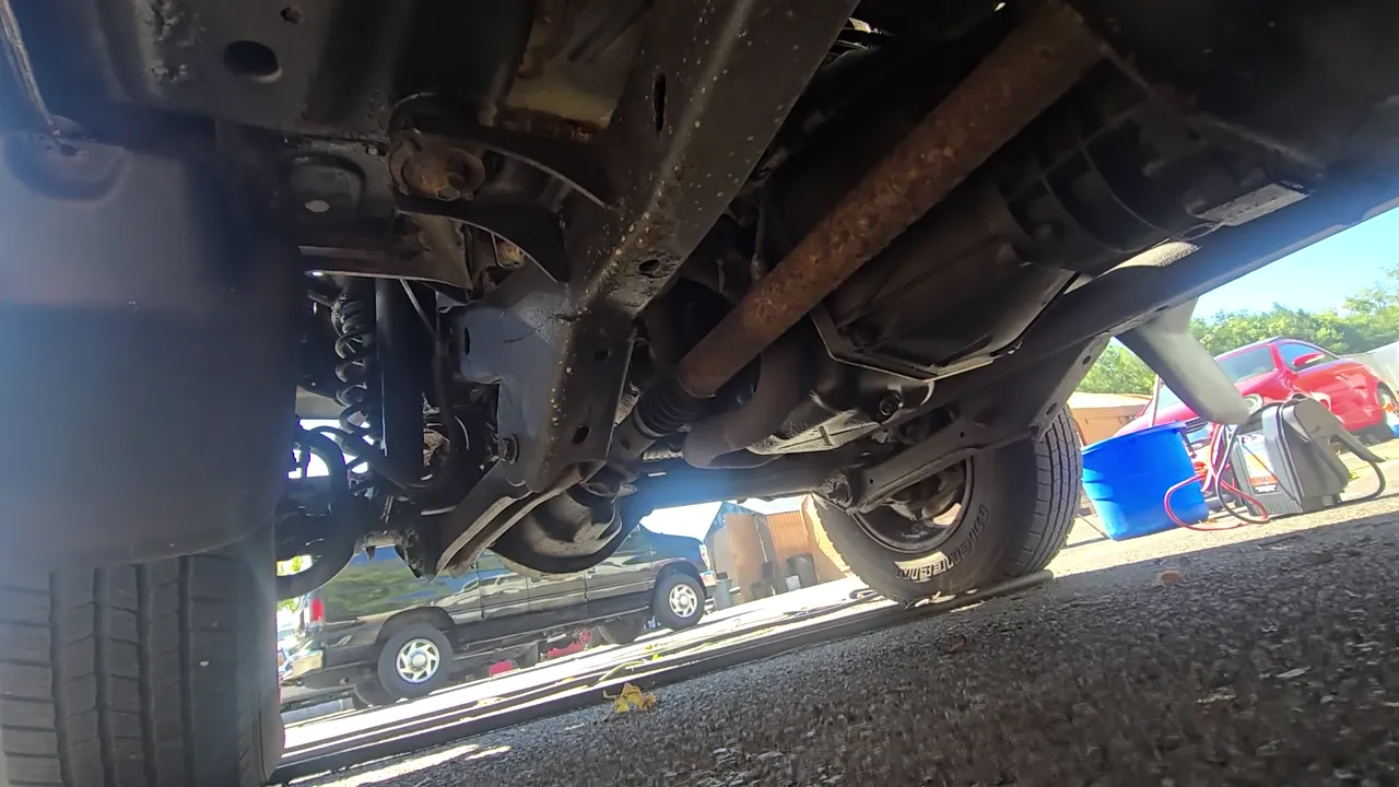 Underneath of 2004 Jeep Wrangler X Sport Utility 2D