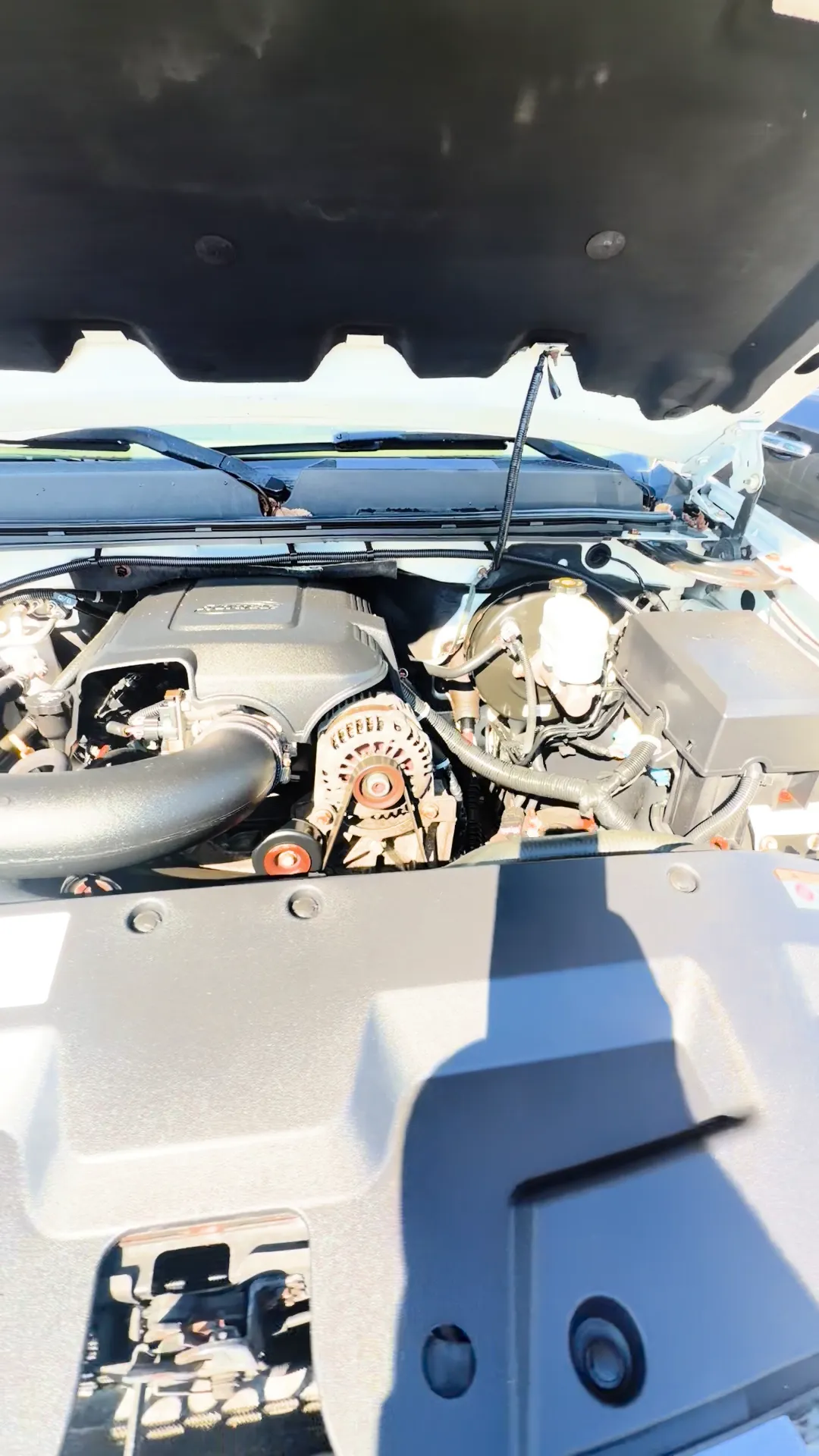 Engine bay of 2011 GMC Sierra 1500 Crew Cab Denali Pickup 4D 5 3/4 ft