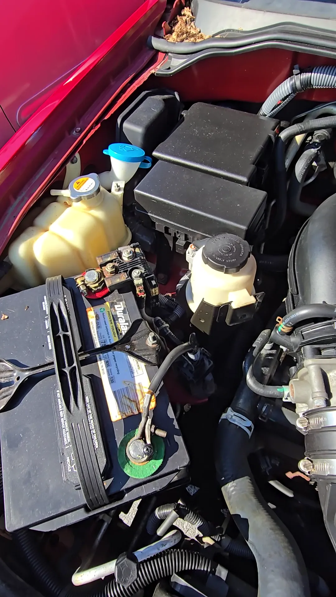 Engine bay of 2011 Suzuki Equator Extended Cab Sport Pickup 2D 6 ft