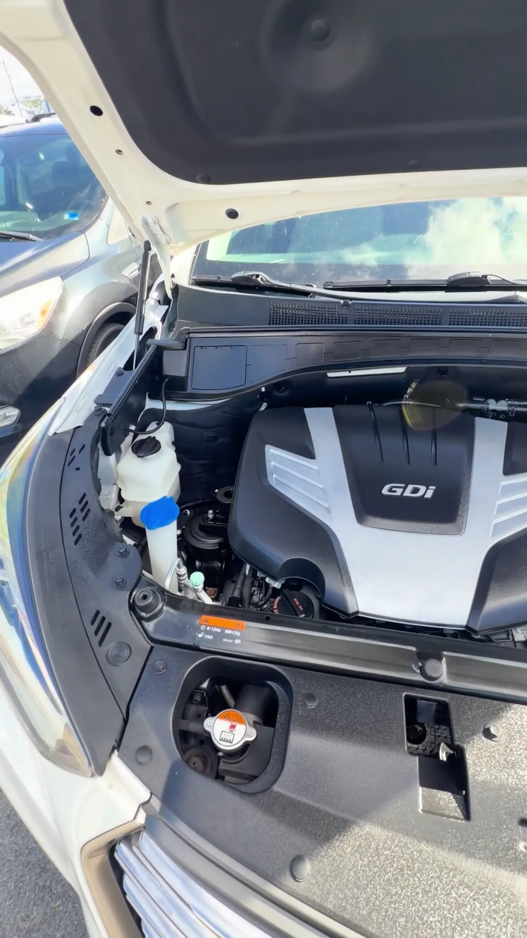 Engine bay of 2017 Hyundai Santa Fe SE Sport Utility 4D